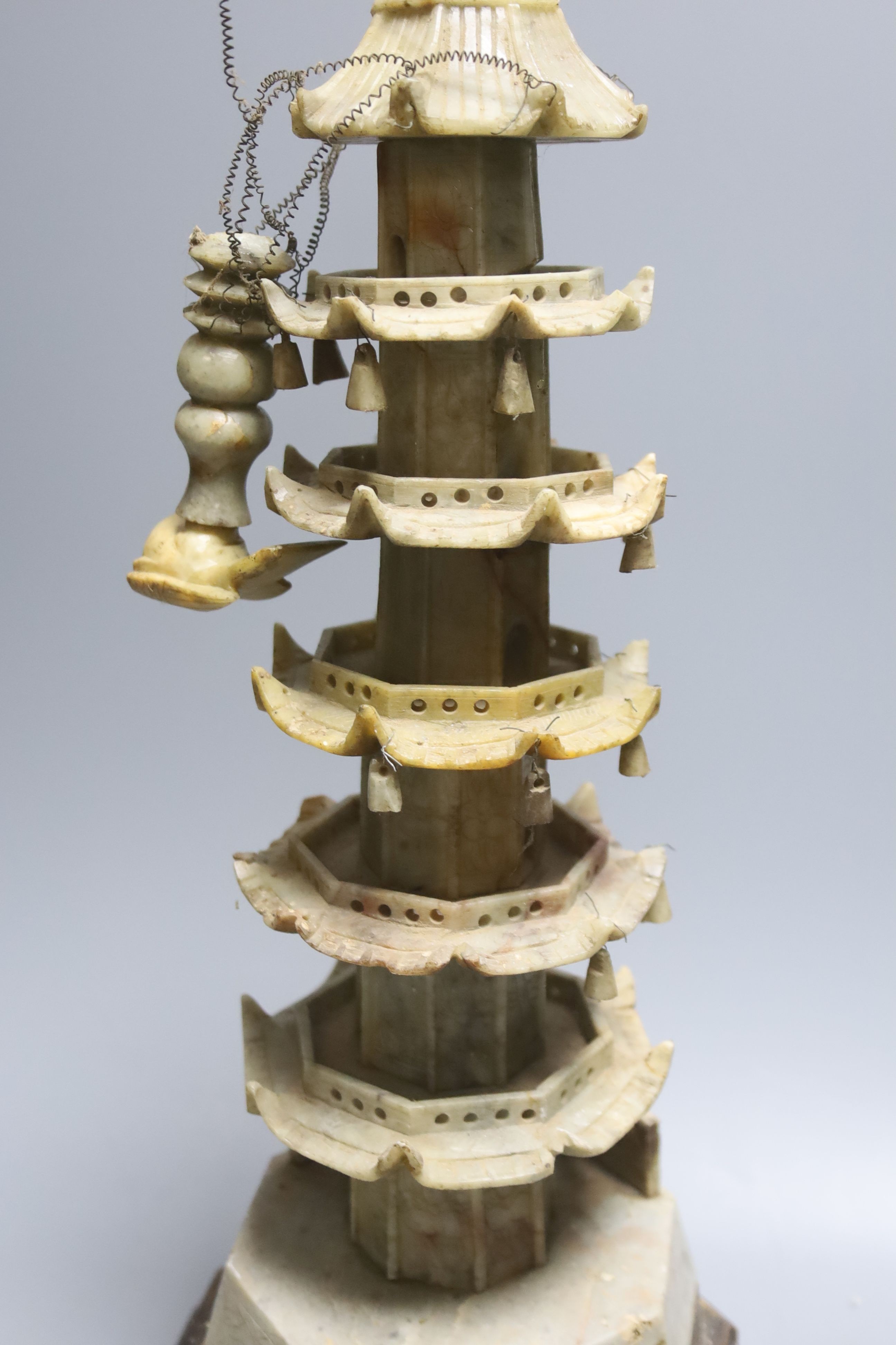 A Chinese soapstone model of a pagoda, early 20th century, 42cm